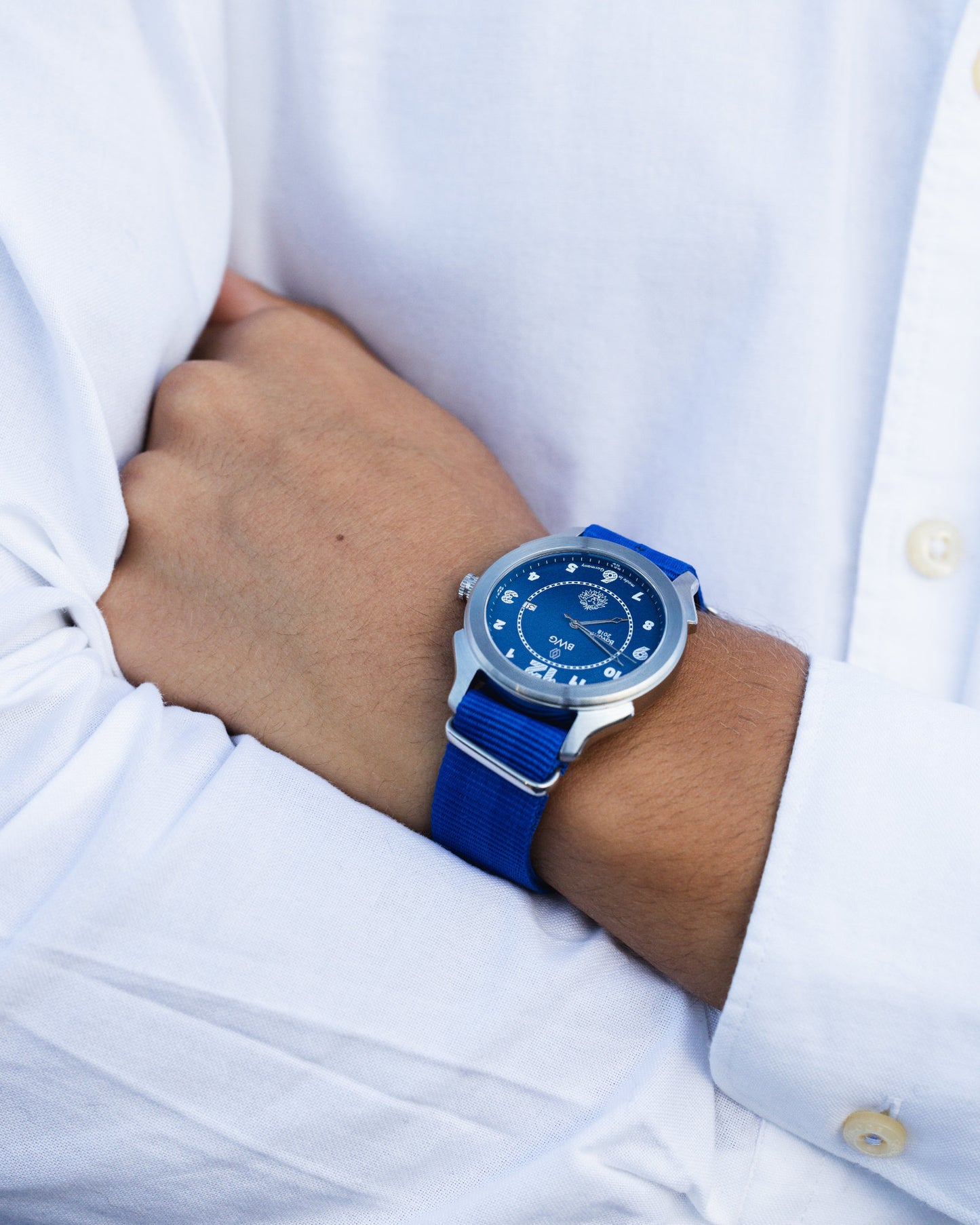Young man wears BWG Bavarian Watch BAVARIA GOOD Design Award- Premium Quartz Watch Swiss Ronda Movement