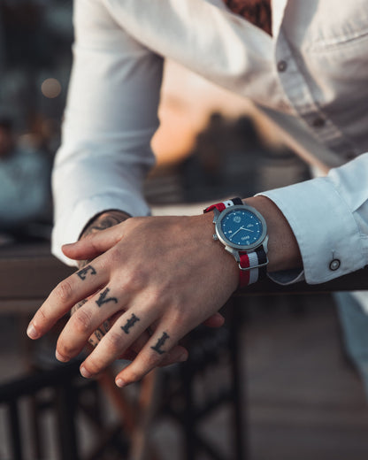 Man with tattooed hand wears a BWG Bavarian watch BAVARIA GOOD Design awarded Premium Quartz Watch with Swiss Ronda Movement
